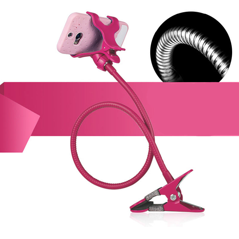Pink phone holder with clip and flexible arm on a white background